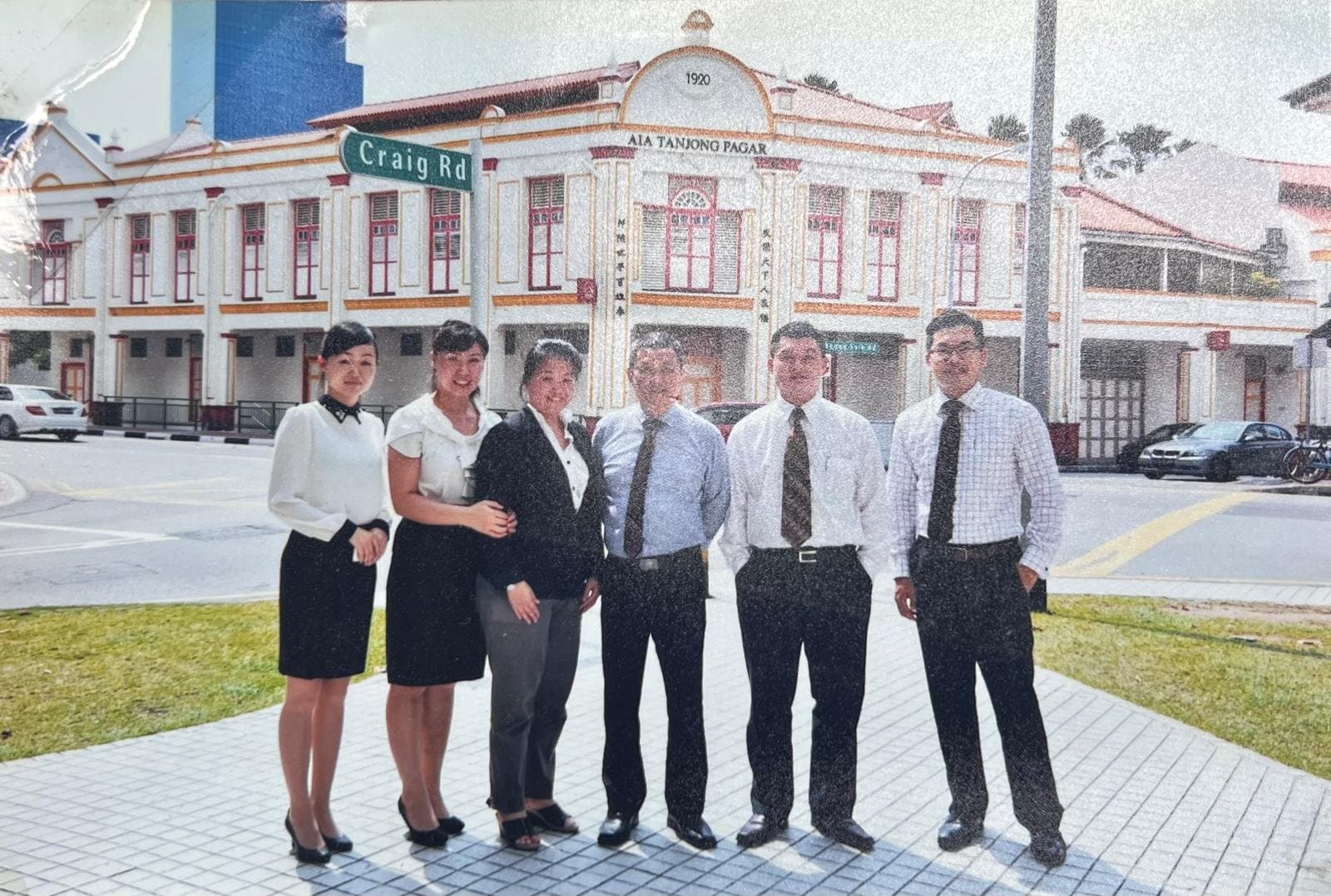 The early SP-Willing team outside the AIA Tanjong Pagar building on Craig Road.